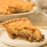slice of derby pie on a small white plate