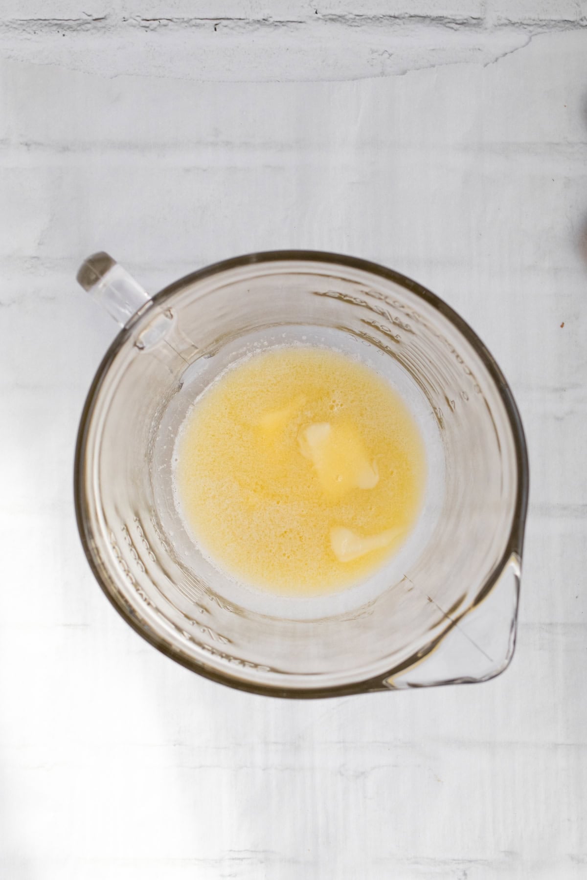 melted butter in a glass bowl.
