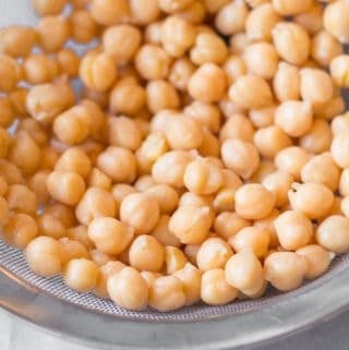 chickpeas in a metal mesh strainer