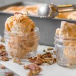pumpkin ice cream scoops in a mason jar.