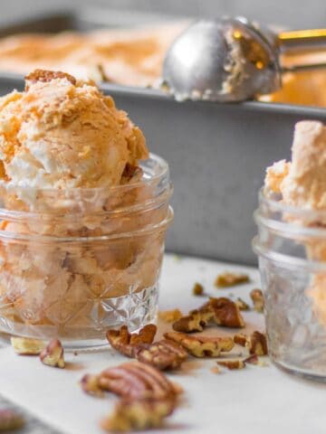 pumpkin ice cream scoops in a mason jar.
