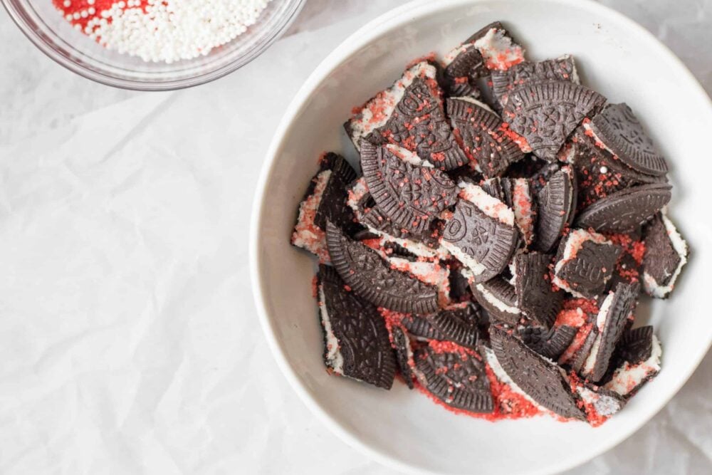 oreos with red sprinkles in a bowl