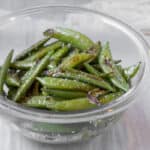 sugar snap peas in a glass bowl