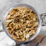vanilla almond granola in a glass jar from overhead