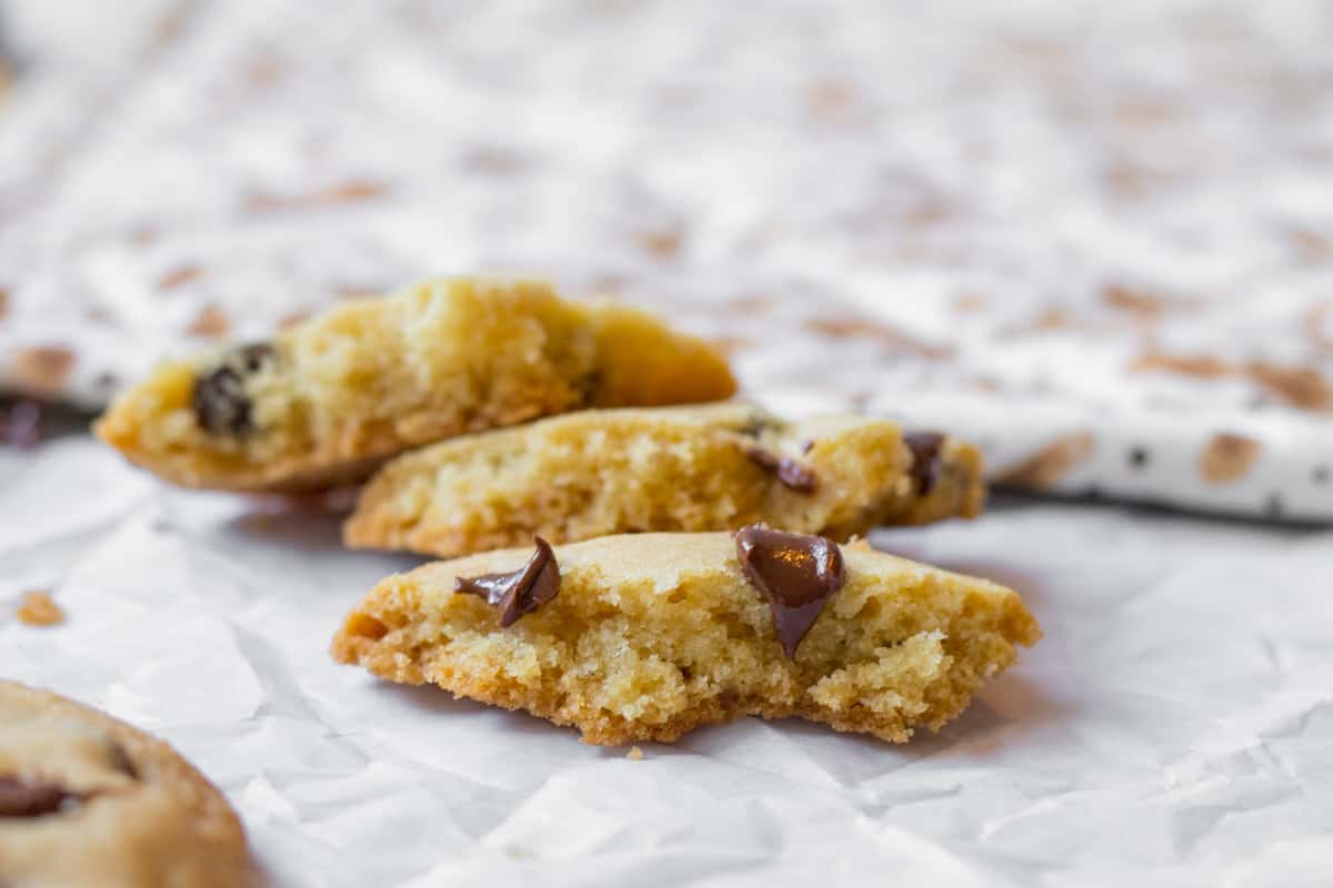 bitten into chocolate chip cookies with matza in the background