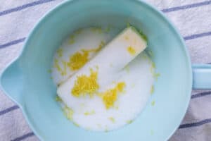 butter, lemon zest and sugar in a mixing bowl