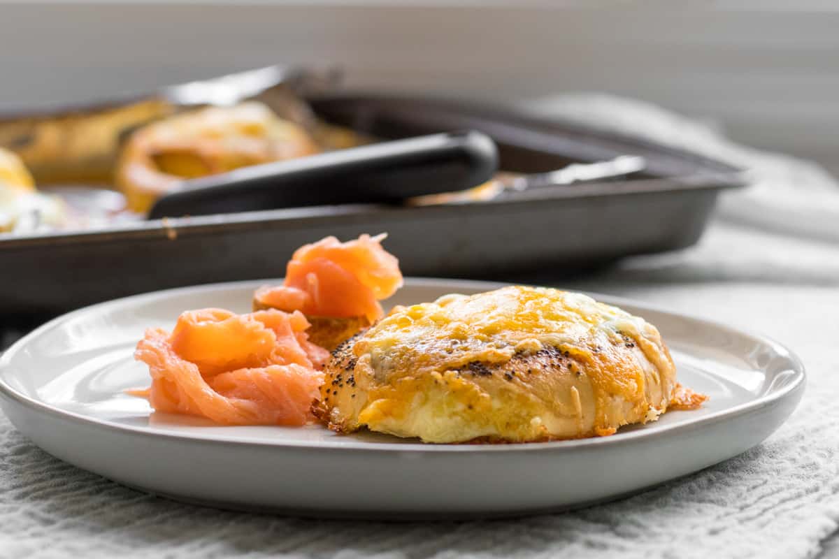 egg in a hole bagel with lox and sheet pan in back