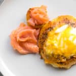 bagel with egg and cheese on a plate with lox