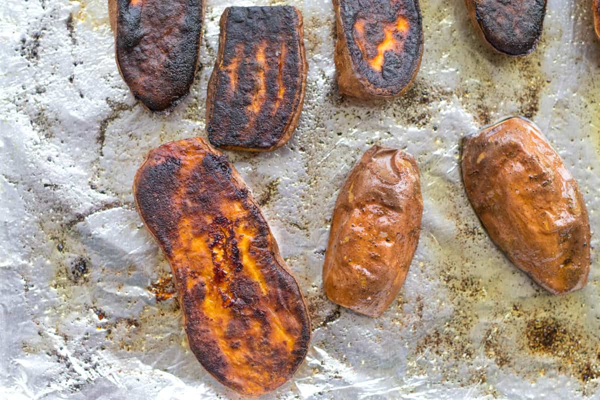 sweet and spicy potato caramelized side up on sheet pan.