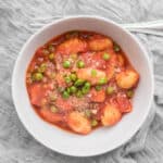 bowl of gnocchi with sweet peas