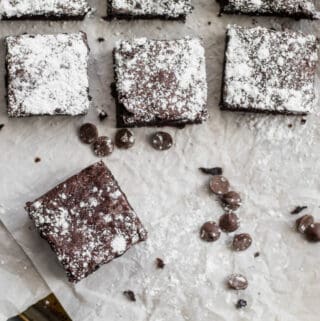 brownies on parchment paper with chocolate chips