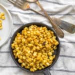 charred corn in a small skillet