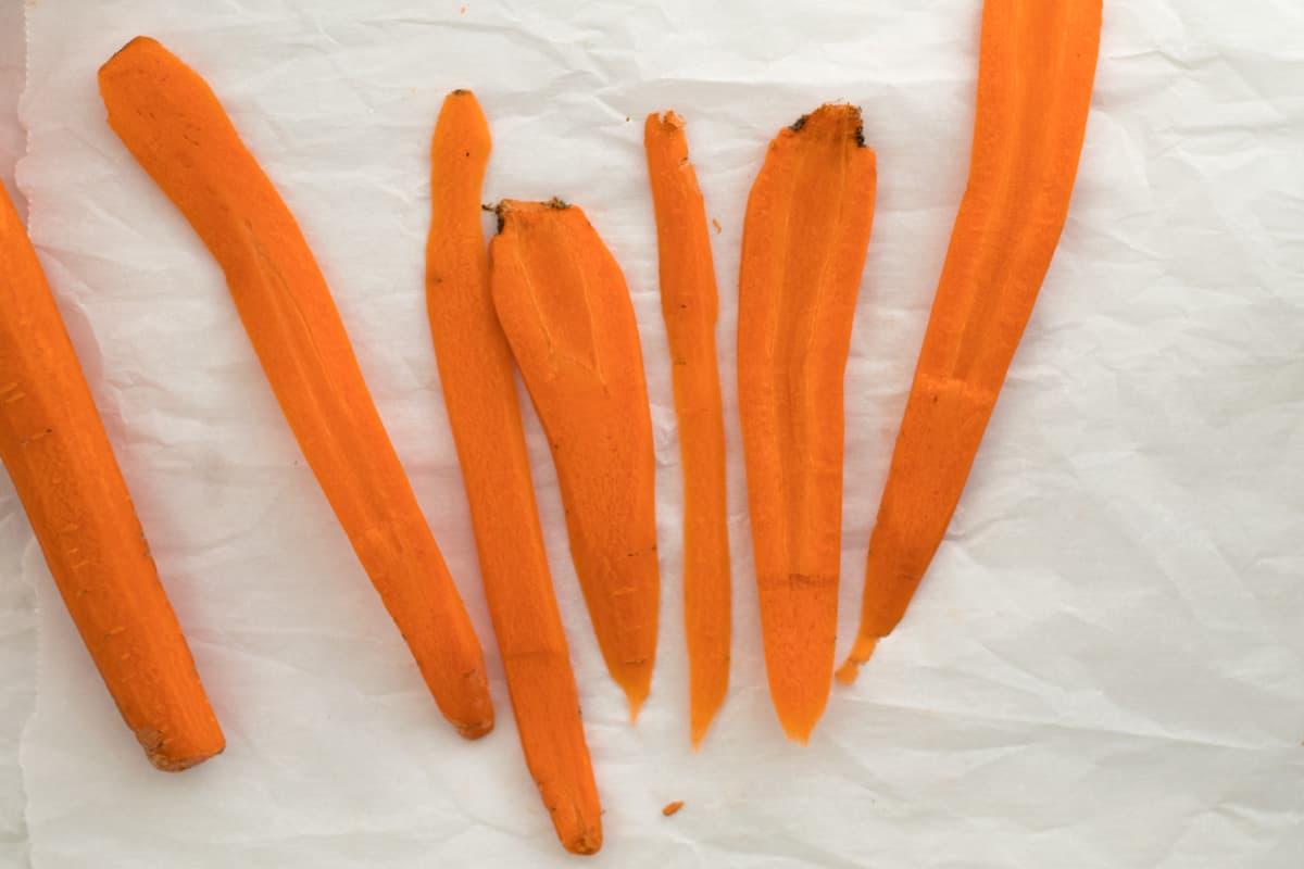strips of carrots on parchment paper
