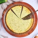 crustless zucchini quiche with two slices cut into it