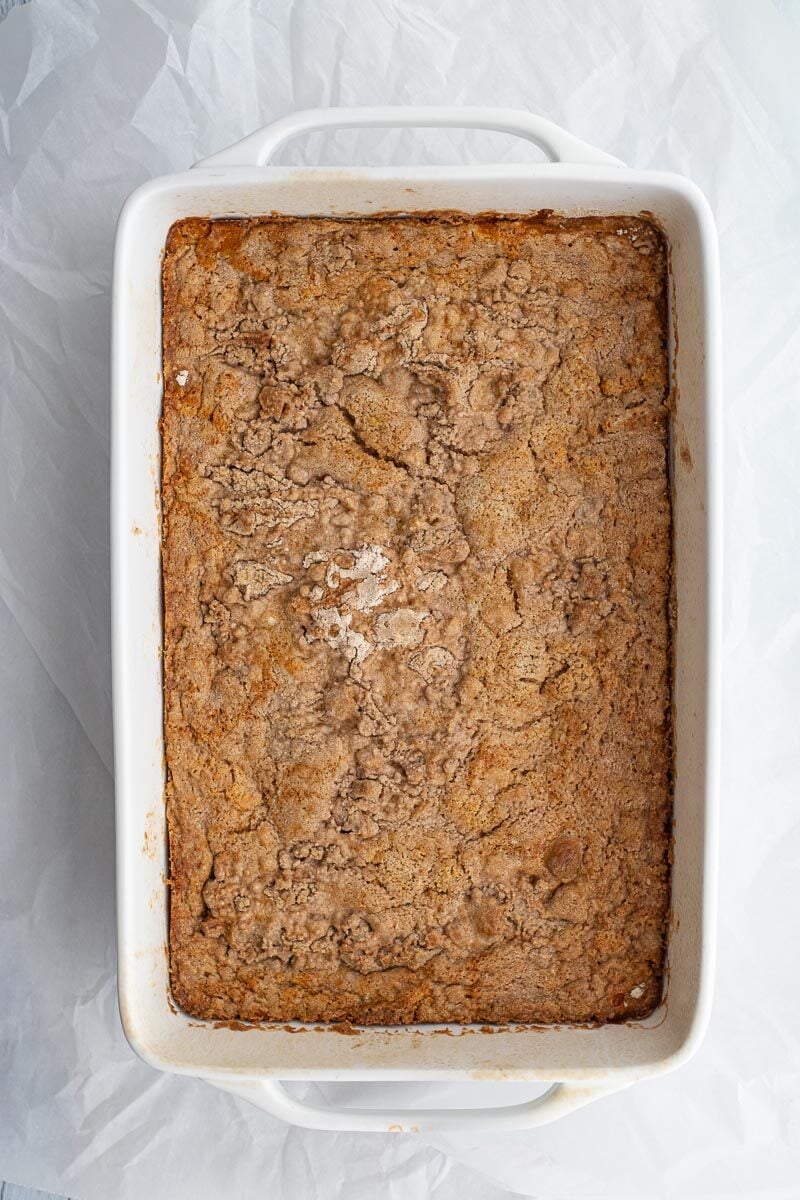 pumpkin dump cake in a ceramic baking dish