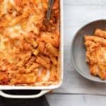 meatless baked zit in a baking dish with a small dish to its side