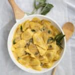 butternut squash ravioli in a sage sauce in the saute pan