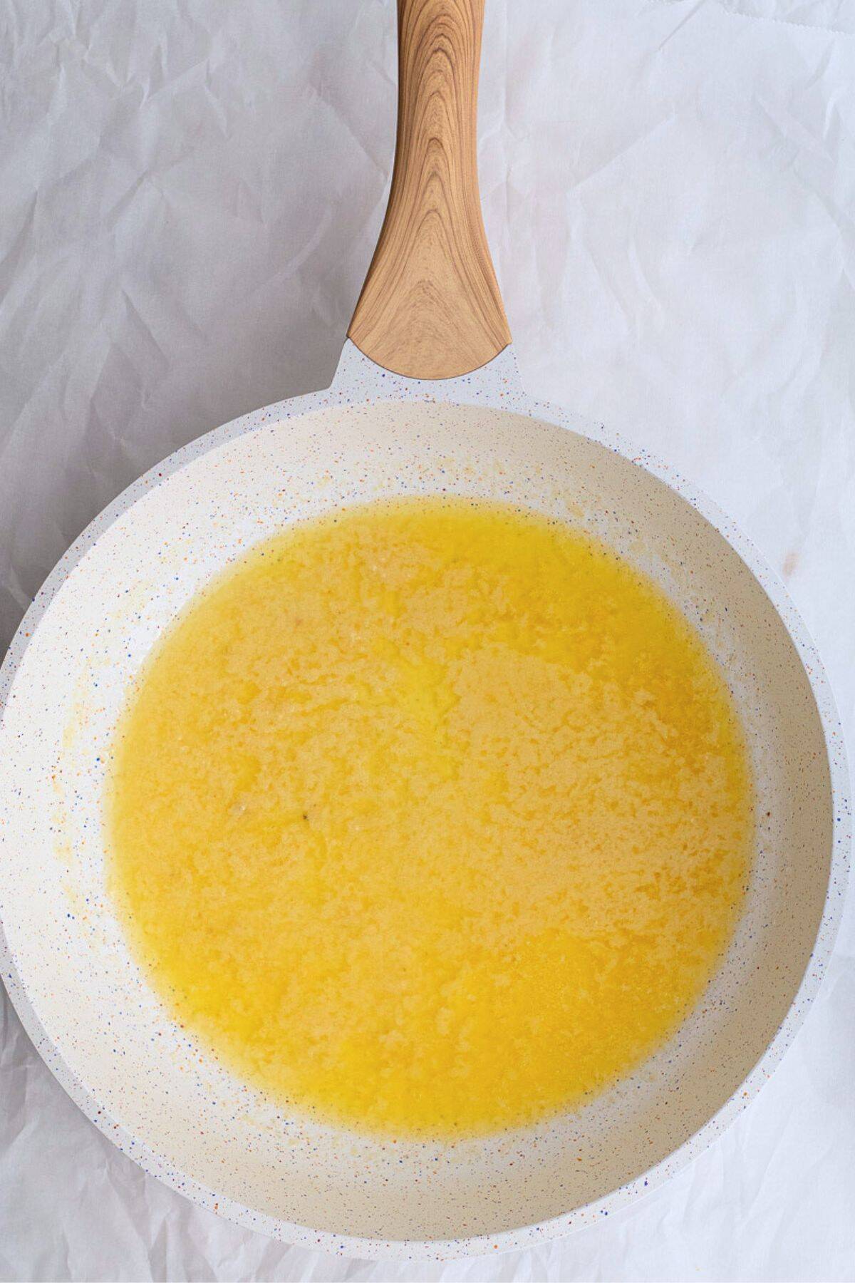 garlic butter melting in a pan
