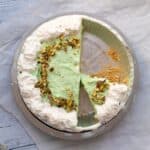 pistachio pudding pie that has been cut in it's pie tin