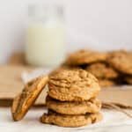 spice cake cookies stacked on parchment paper