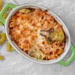 artichoke baked pasta in a baking dish