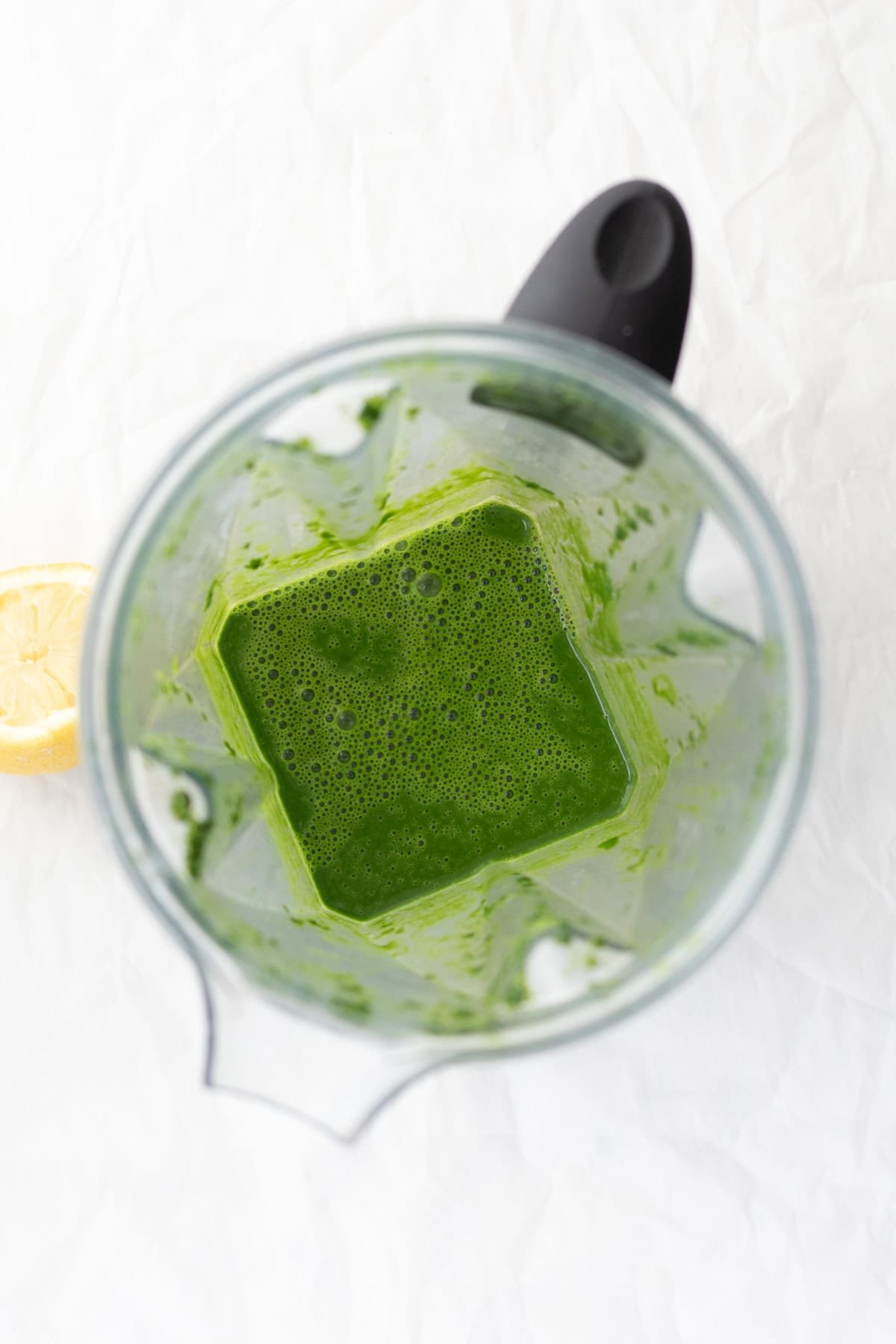 thin spinach puree in a blender container