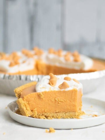 piece of butterscotch pudding pie on a white plate