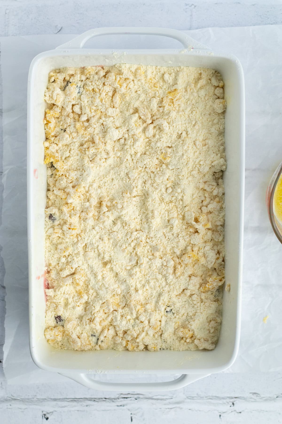 cake mix sprinkled over fruit filling