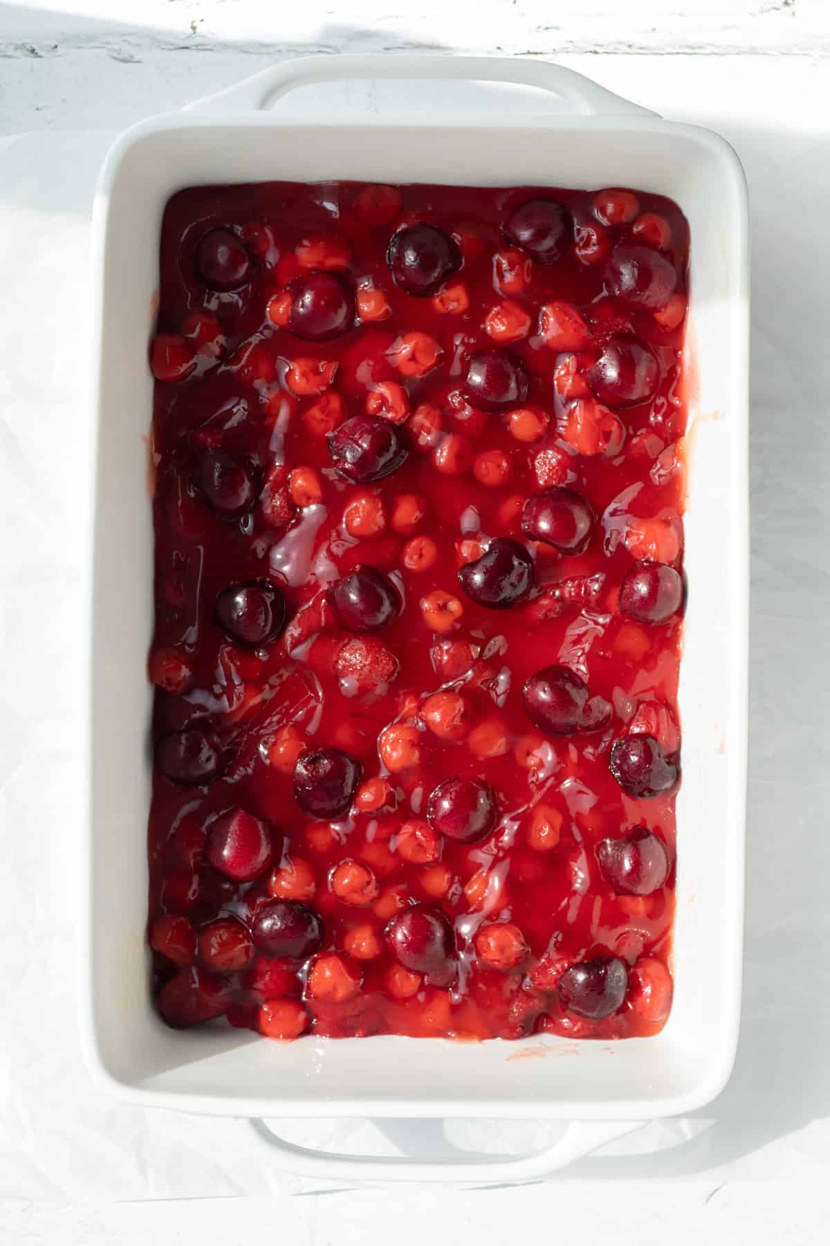 cherry pie filling in a baking dish