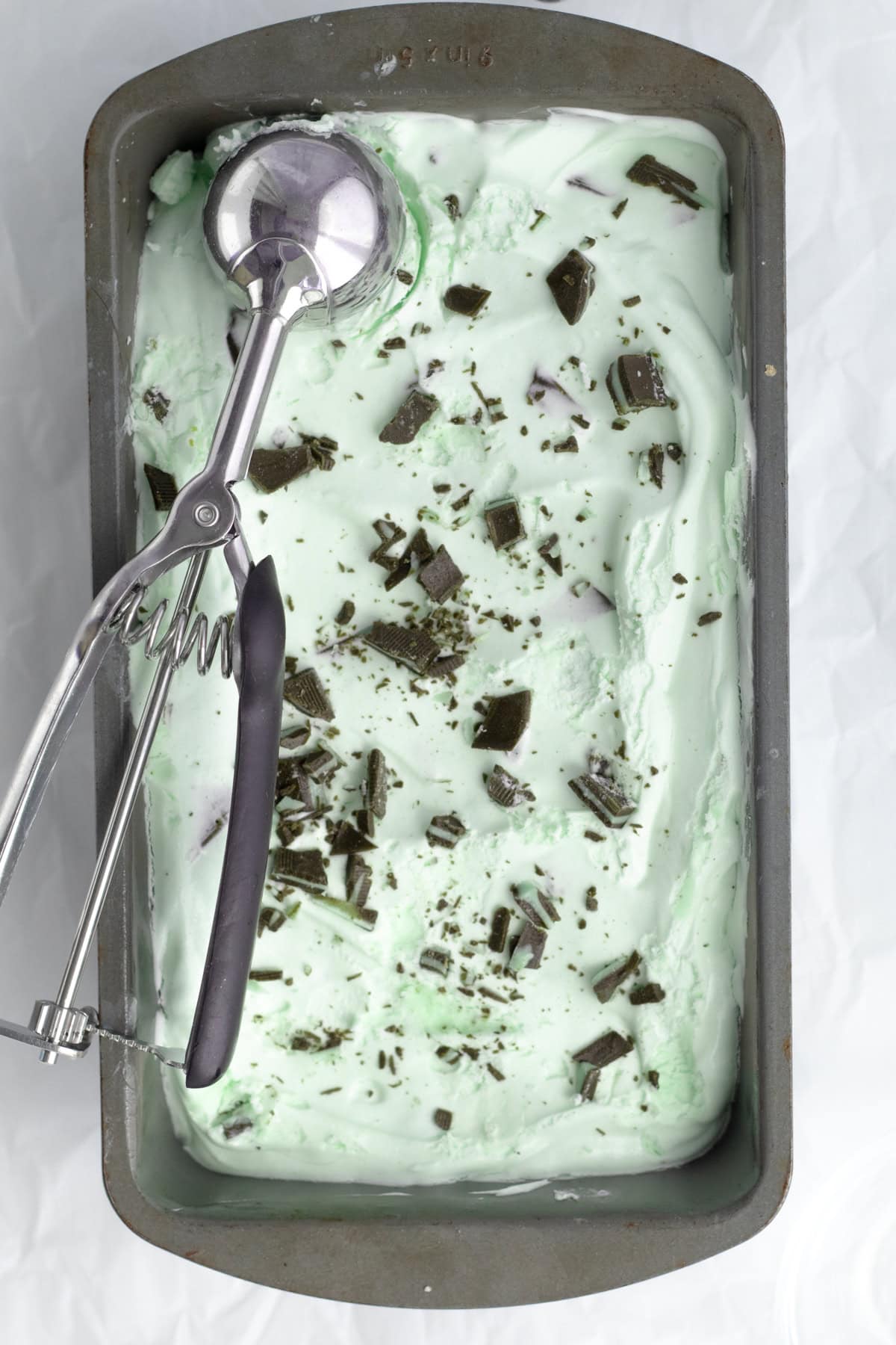 mint chip ice cream with a ice cream scoop