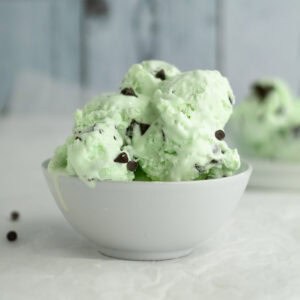 no churn mint chocolate chip ice cream in a white bowl