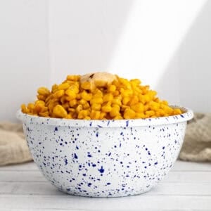 miso corn in a blue speckled bowl