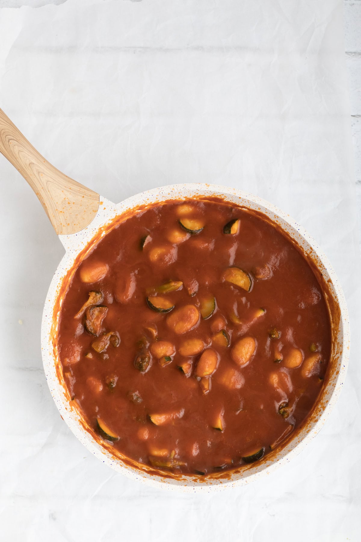 gnocchi cooking in marinara sauce.