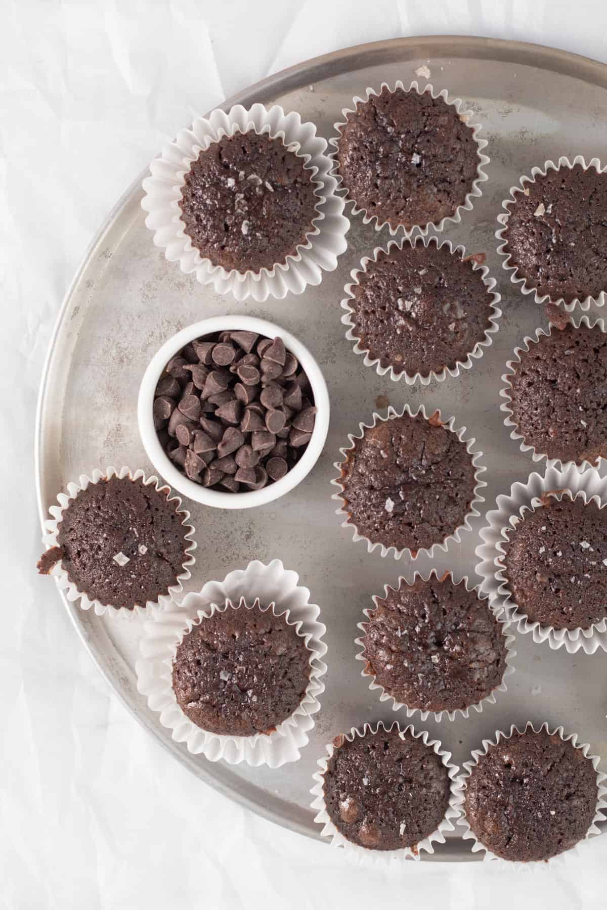 two bite brownies on a round serving tray.