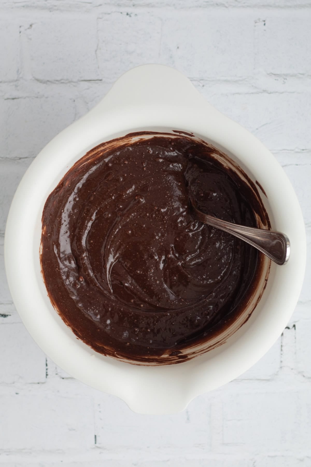 brownie batter mixed in a mixing bowl.