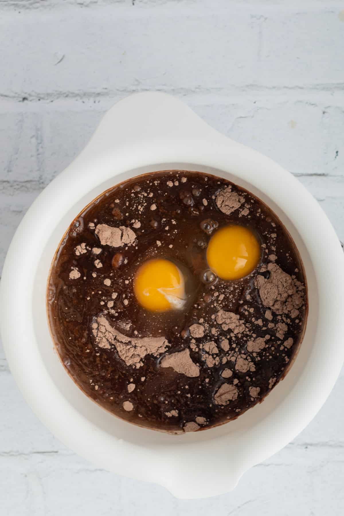 brownie mix, eggs, oil, vanilla, and espresso in a mixing bowl.