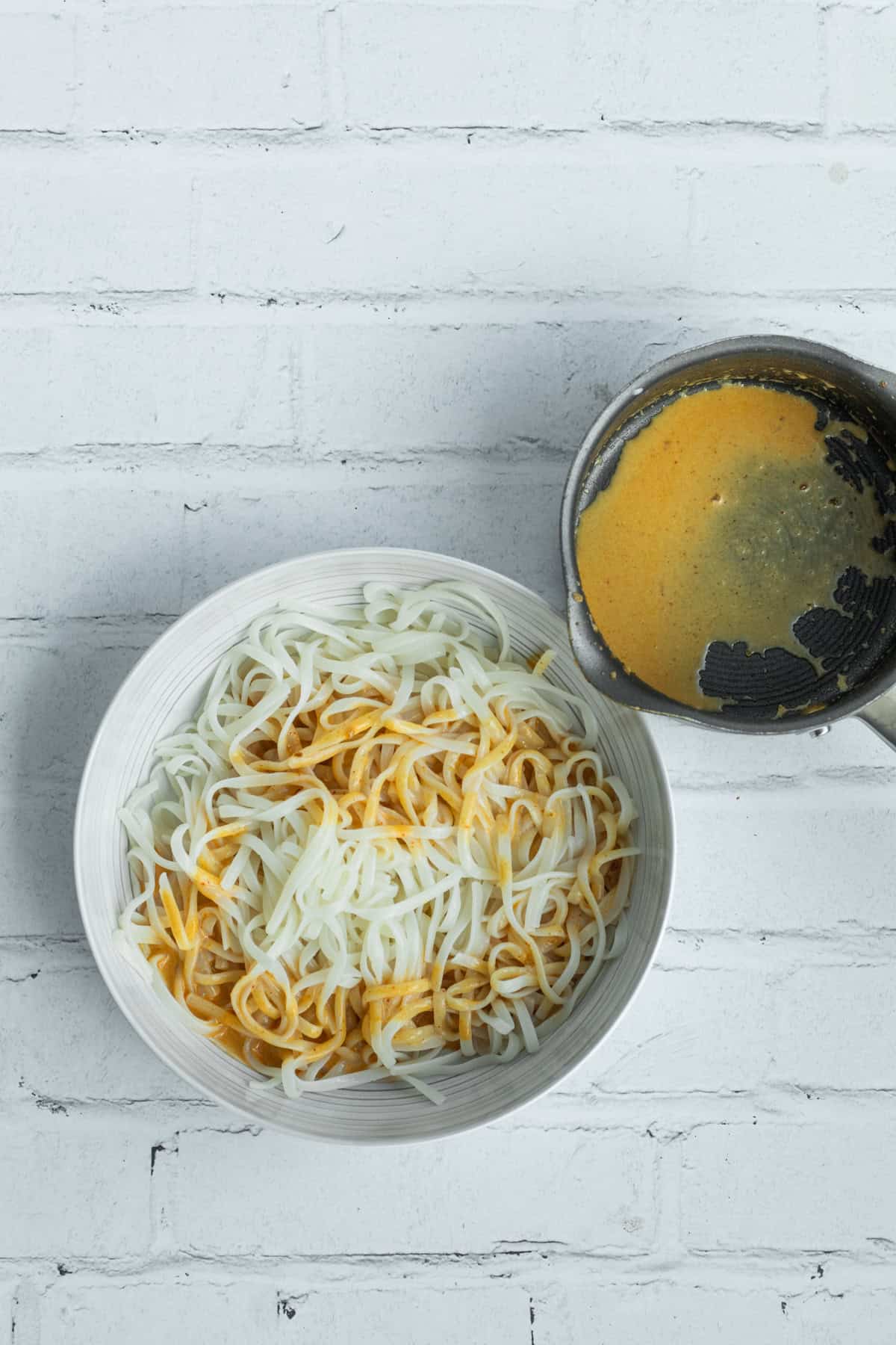 sauce added to hot noodles.