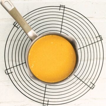 thai red curry sauce in a pot on a cooling rack